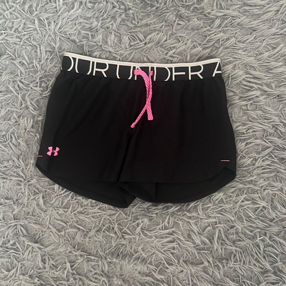 Black under armor shorts with a pink lace